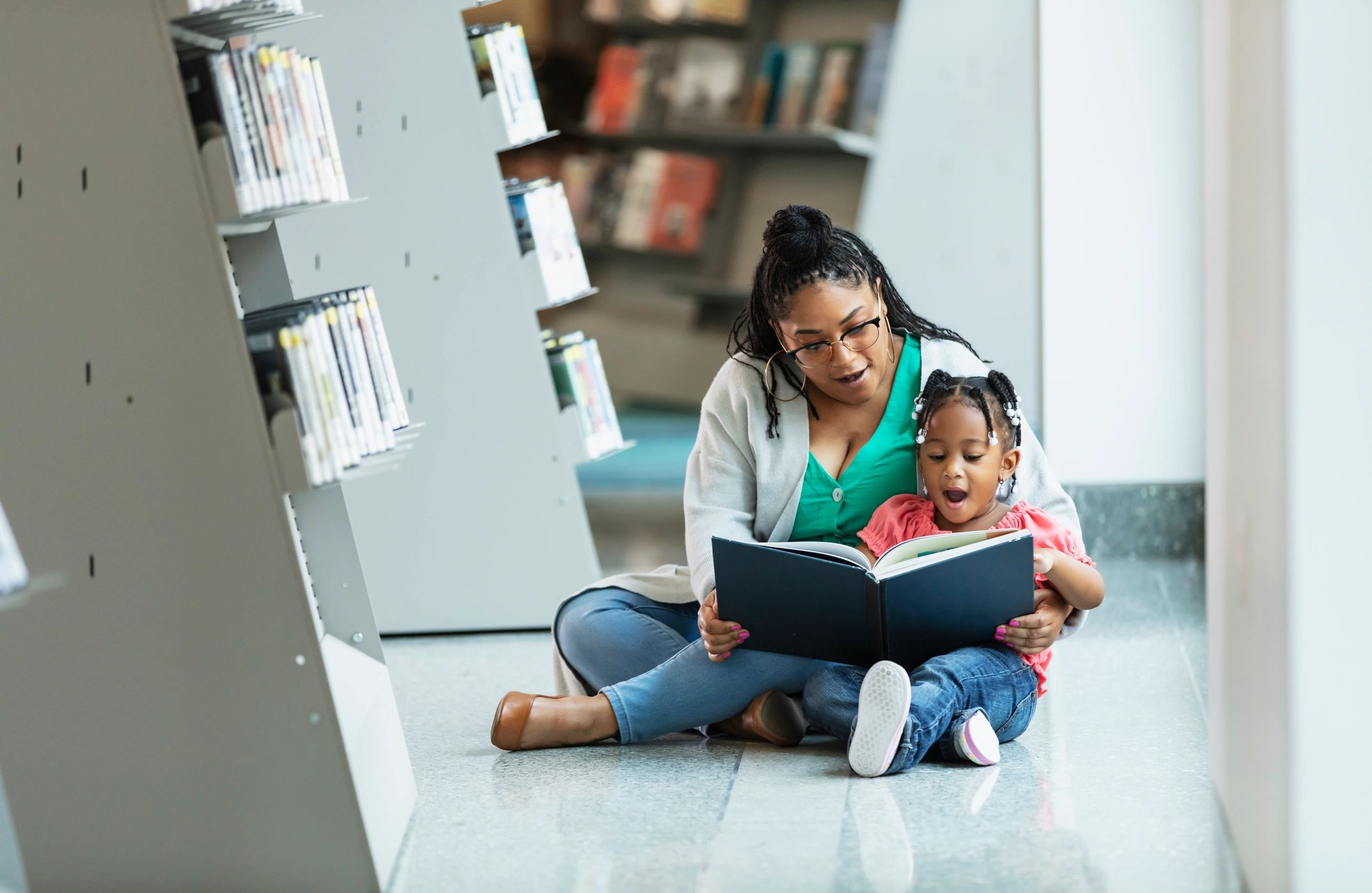 Parent and child reading together