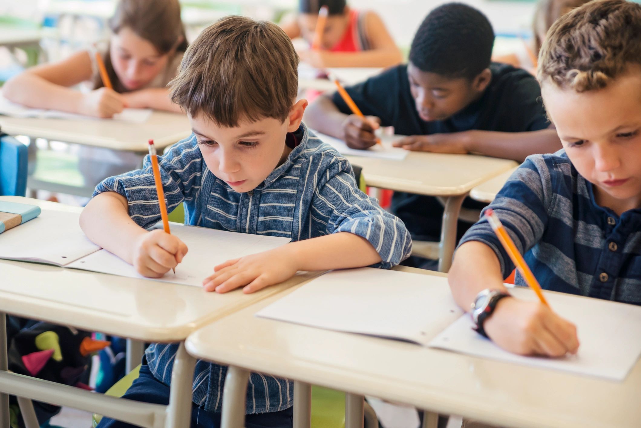 Elementary students working quietly at desks